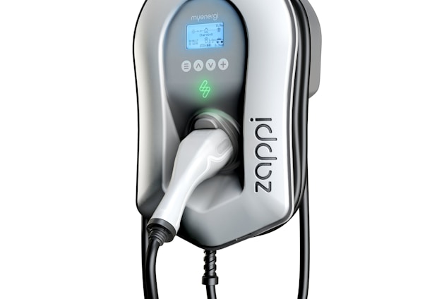 A sleek, modern electric vehicle charging unit with a digital display. The design showcases a gray and black color scheme, featuring a prominent charging cable and plug. The branding and control buttons are visible, including a logo and green indicator light.